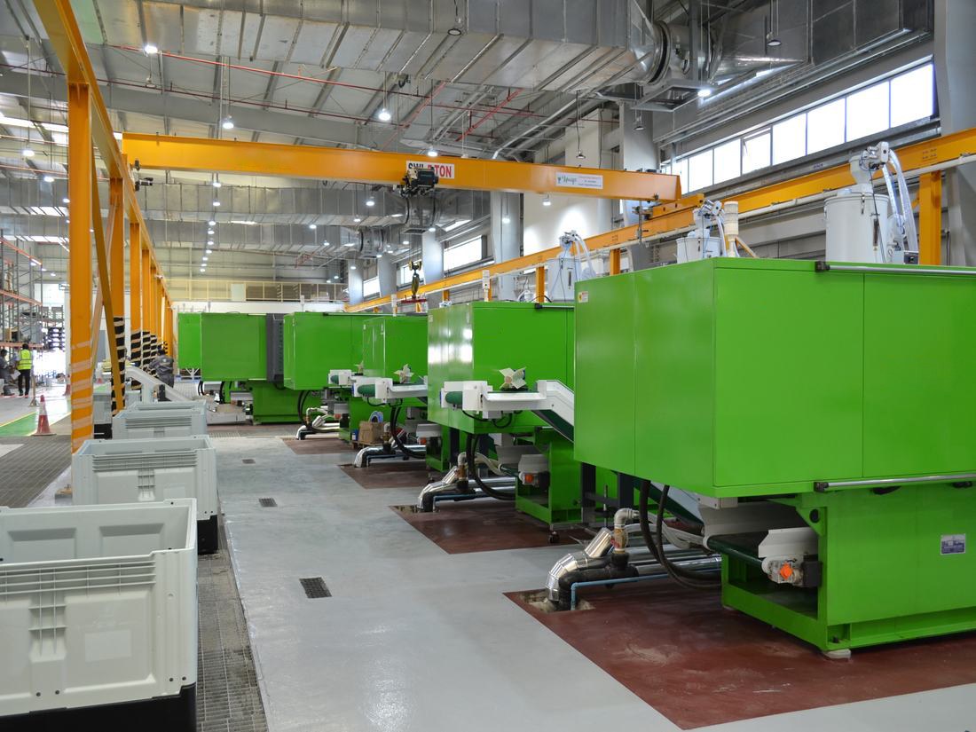 Injection moulding machines producing PVC-U fittings at KEZAD